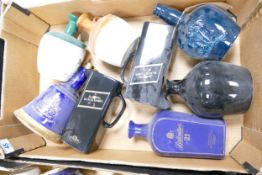 A collection of Wade Ceramic Whiskey & Spirit Bottles /decanters to include Ballantines, Chivas,