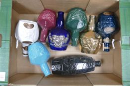 A collection of Wade Whisky & Spirit Decanters including Royal Saulte, Chives, Butterfly Canyon