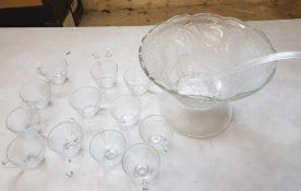 Pressed glass punch bowl together with 12 punch cups, hooks and ladel (1 tray)
