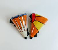 Two Lorna Bailey wall pockets, one in the Circus pattern, one in the Sunburst pattern