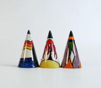 Three Lorna Bailey sugar sifters, one in the Stoke-on-Trent pattern, one in the Carnival pattern and