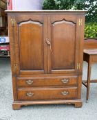 Reproduction Oak Television Cabinet in the manner of Titchmarsh & Goodwin. H:122cm L:93cm D:62cm