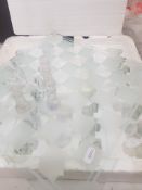 A frosted and clear glass/crystal chess set and glass board, board measures 34cm.