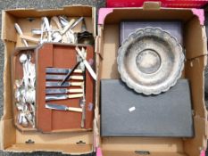 A mixed collection of items to include Cased Dressing Table Sets, Loose Cutlery, Silver Plated