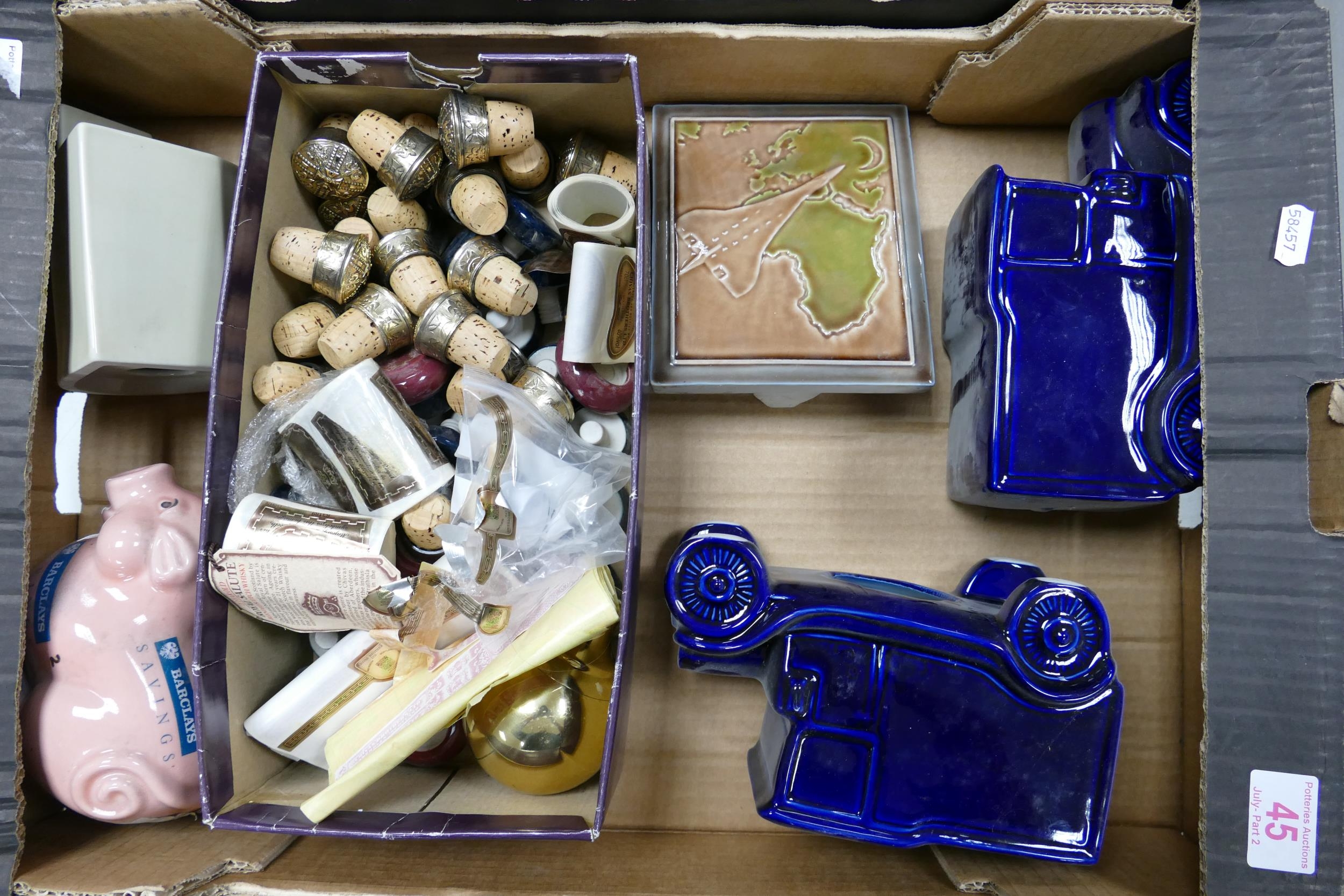 A collection of Wade Advertising Plaque, Money Boxes, Chivas Cork Tops, Concorde Ceramic plaque