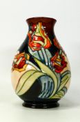 Moorcroft vase in the red tulips pattern, 19cm high.
