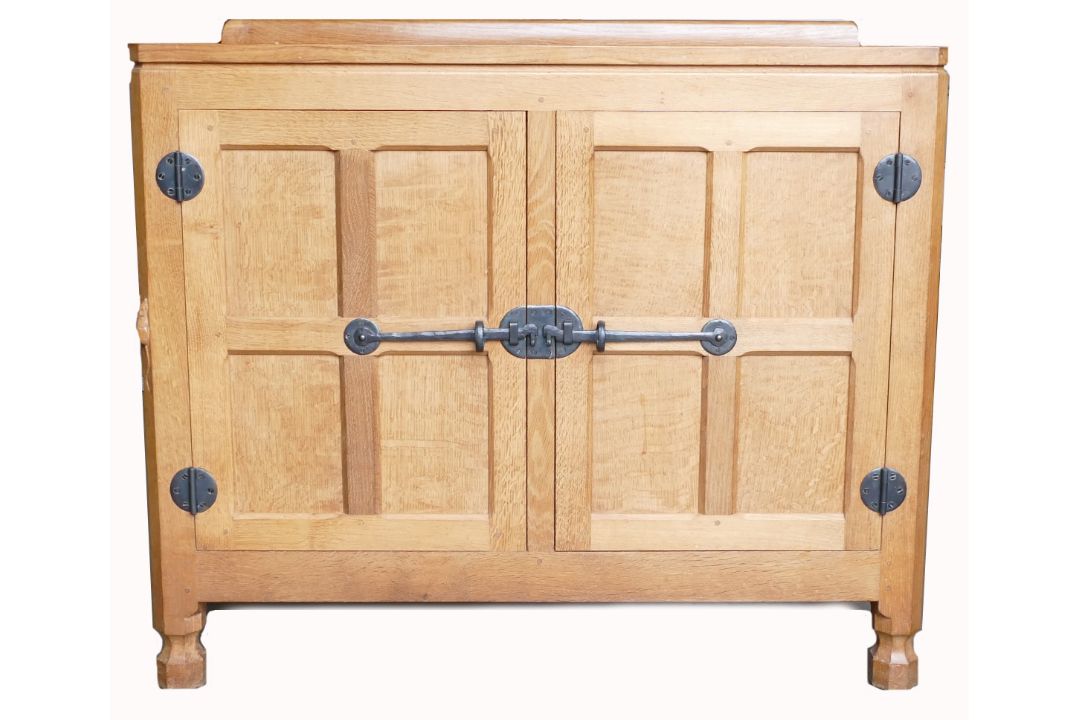 Robert 'Mouseman' Thompson (Kilburn), an English Oak panelled drinks cupboard, with raised - Image 1 of 6