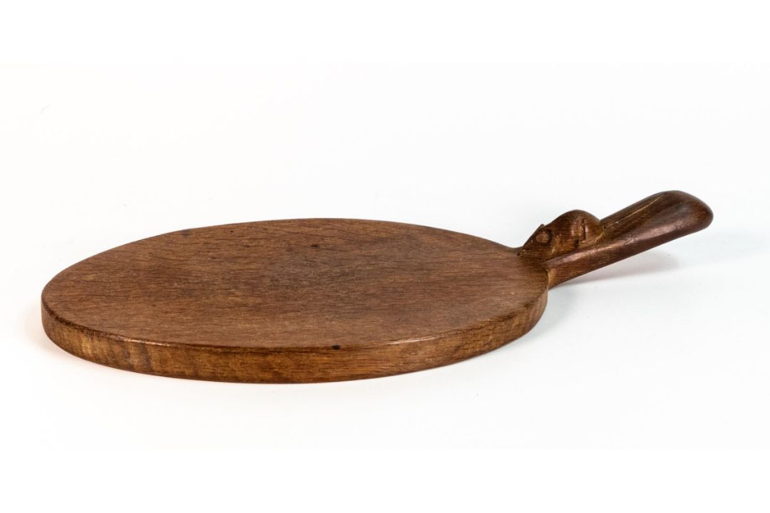 Robert 'Mouseman' Thompson solid English oak hand carved single handle cheeseboard. Oval form with - Image 1 of 4