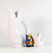 Wade collection of multicoloured Gluggle jugs made for Shreve Crump & Low Company Boston. TThese