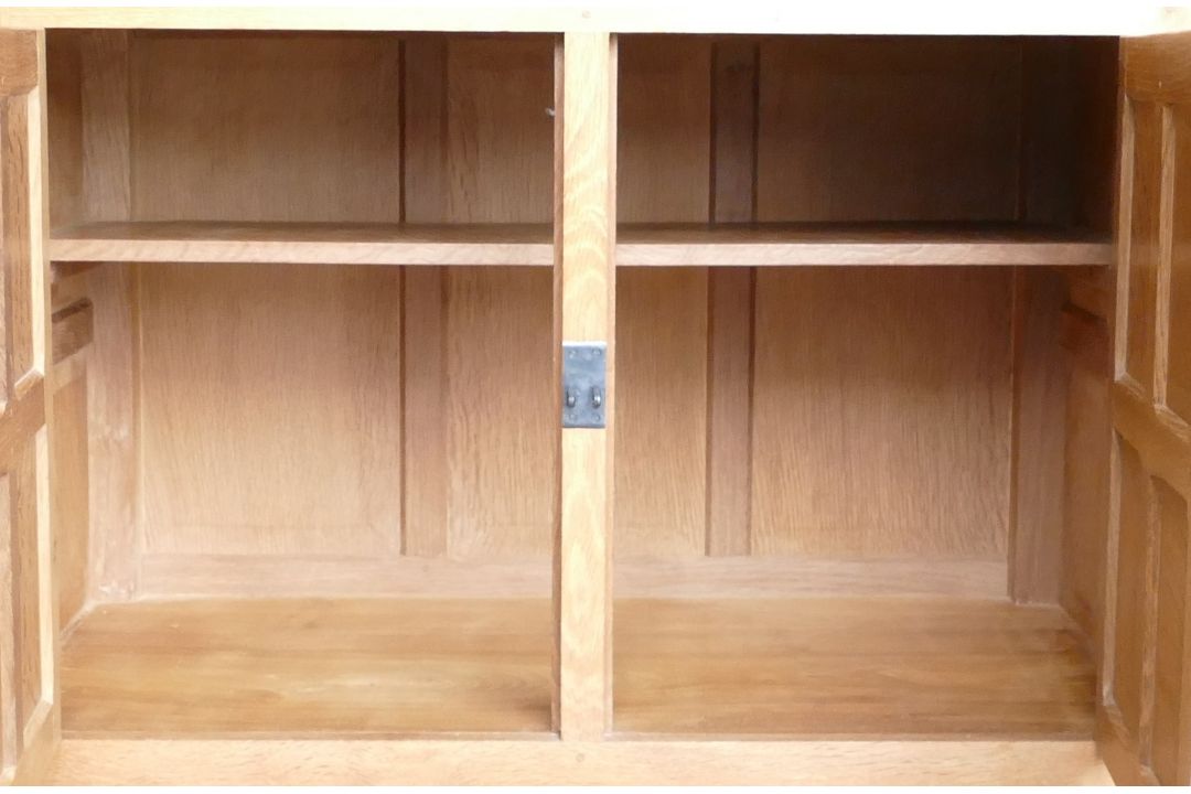 Robert 'Mouseman' Thompson (Kilburn), an English Oak panelled drinks cupboard, with raised - Image 3 of 6