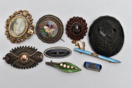 A SELECTION OF BROOCHES, to include an 'Arthur Johnson Smith' enamel lily of the valley brooch,