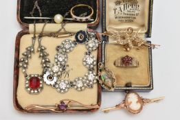 A BAG OF JEWELLERY, to include a yellow metal cameo brooch, fitted with a brooch pin and safety