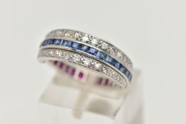 A WHITE METAL 'DAY AND NIGHT' GEM SET RING, designed with a band of half square cut rubies and