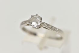 A PLATINUM SINGLE STONE DIAMOND RING, the old cut diamond in an eight claw setting, with three
