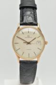 A 9CT GOLD GARRARD WRISTWATCH, with quartz movement, circular gold coloured dial signed Garrard