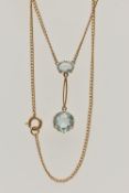 AN EDWARDIAN AQUAMARINE PENDANT NECKLACE, yellow metal, drop pendant set with a circular cut