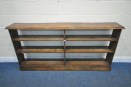 A 20TH CENTURY OAK OPEN BOOKCASE, fitted with four fixed shelves, length 190cm x depth 28cm x height
