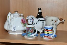 A GROUP OF TEAWARE, comprising a Royal Albert 'American Beauty' pattern teapot (small pit in the
