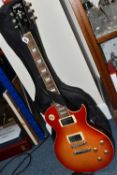 A 'VINTAGE' LES PAUL TYPE GUITAR, bolt on neck, soft case and shoulder strap, cherry burst