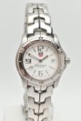 A 'TAG HEUER' LINK PROFESSIONAL WRISTWATCH, quartz movement, round white dial signed 'Tag Heuer'