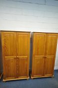 A PAIR OF MODERN PINE DOUBLE DOOR WARDROBES, width 94cm x depth 72cm x 177cm (condition report: