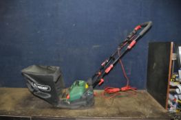 A QUALCAST SCM32A ELECTRIC CYLINDER MOWER with grass box (PAT pass and working)