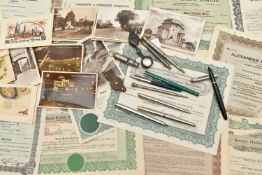 A BOX OF PENS, POSTCARDS, SHARE CERTIFICATES, ETC, including five early 20th century embroidered
