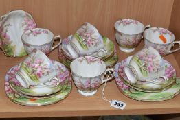 A TWENTY PIECE ROYAL ALBERT BLOSSOM TIME PART TEA SET, comprising a shell shaped sugar bowl, seven
