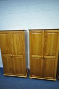 A PAIR OF MODERN PINE DOUBLE DOOR WARDROBES, width 94cm x depth 72cm x 177cm (condition report: