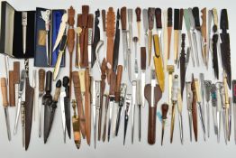 APPROXIMATELY EIGHTY ASSORTED LETTER OPENERS IN TREEN, PLASTIC AND ASSORTED BASE METALS, includes
