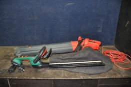 A QUALCAST CHT18LA1 CORDLESS HEDGE TRIMMER with one battery and charger , a matching pole hedge