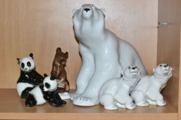 A GROUP OF LOMONOSOV POLAR BEARS AND OTHER ANIMALS, comprising a large Polar Bear, height 27cm x