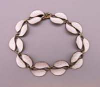 A David Andersen white enamel and silver bracelet. 19 cm long.