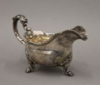 A Georgian silver sauce boat. 21 cm long. 14.4 troy ounces.