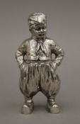 A Continental silver pepper formed as a Dutch boy. 12 cm high. 166 grammes.