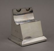 A silver combination stamp box and inkwell. 9.5 cm high. 260 grammes total weight.