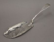 An Irish silver fish slice, hallmarked 1820. 31 cm long. 5.2 troy ounces.