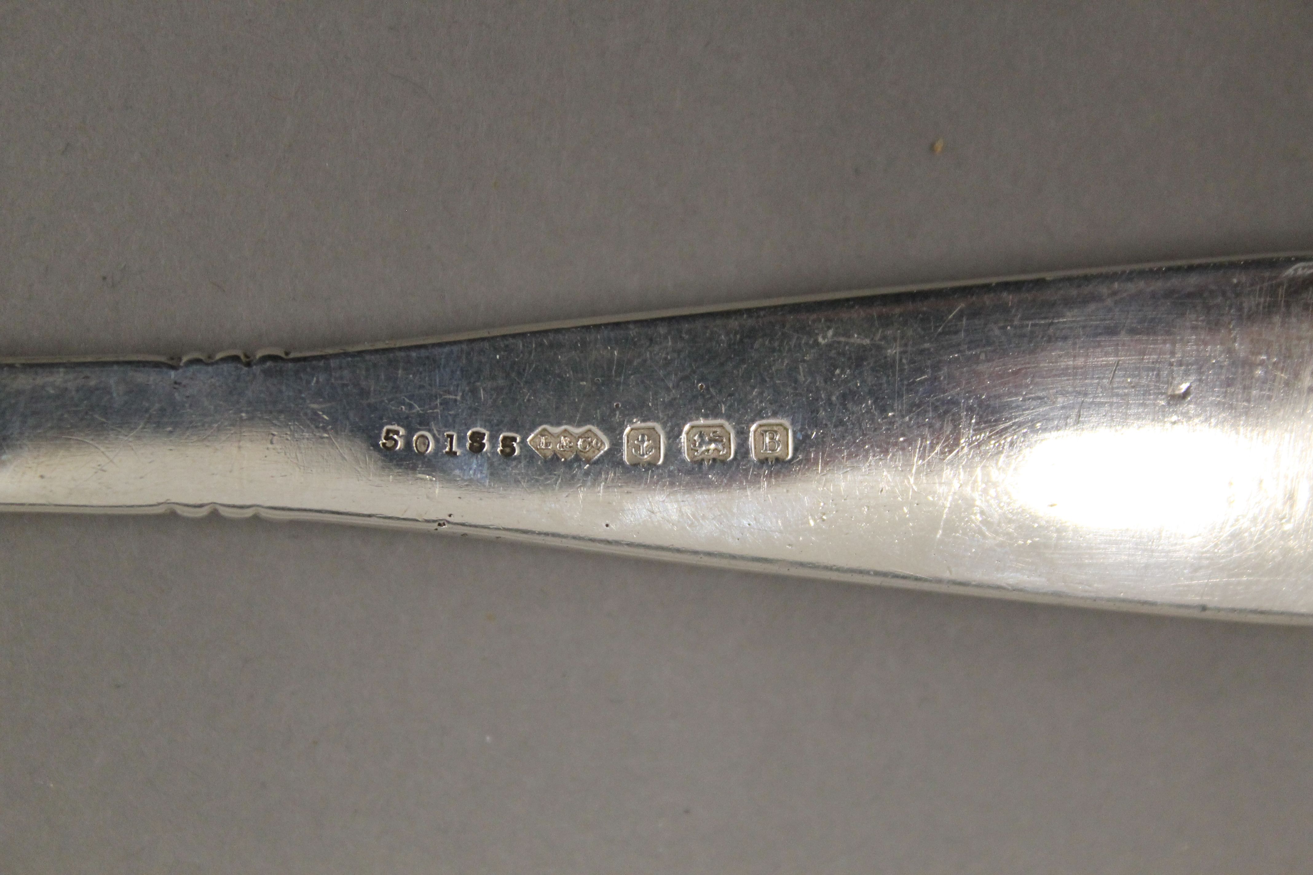 A Liberty and Co silver cake slice. 18.5 cm long. 94.7 grammes total weight. - Image 3 of 3