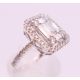 An 18 ct white gold ring with 5 baguette cut diamonds surrounded by numerous brilliant cut diamonds. - Image 4 of 8