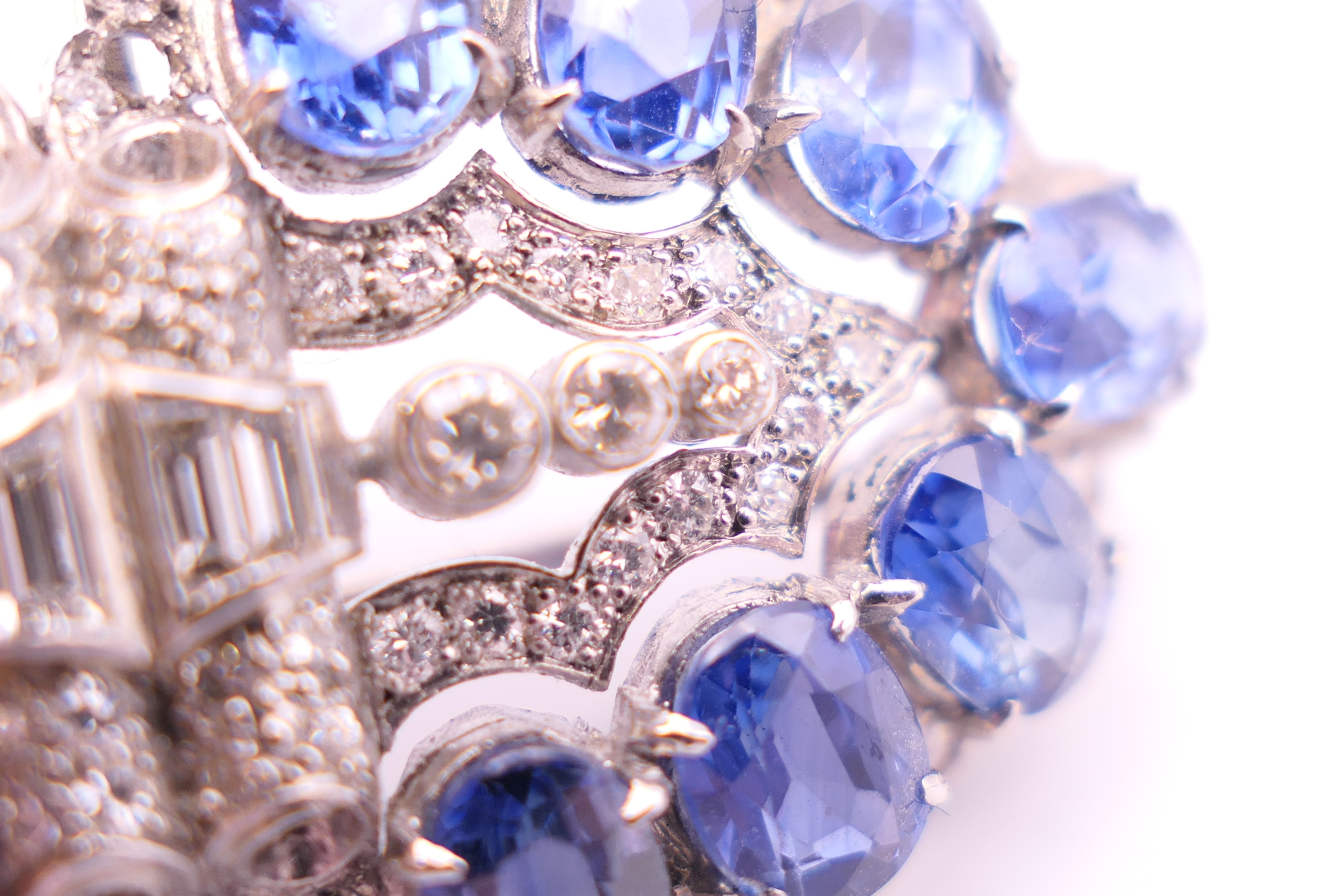 An unmarked Garrard and Co Ltd sapphire and diamond brooch, cased. 5 cm x 2 cm. - Image 7 of 19