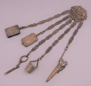 A 19th century chatelaine. 31 cm long.