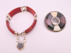 A 19th century Scottish target brooch, the silver inlaid with hardstone segments,