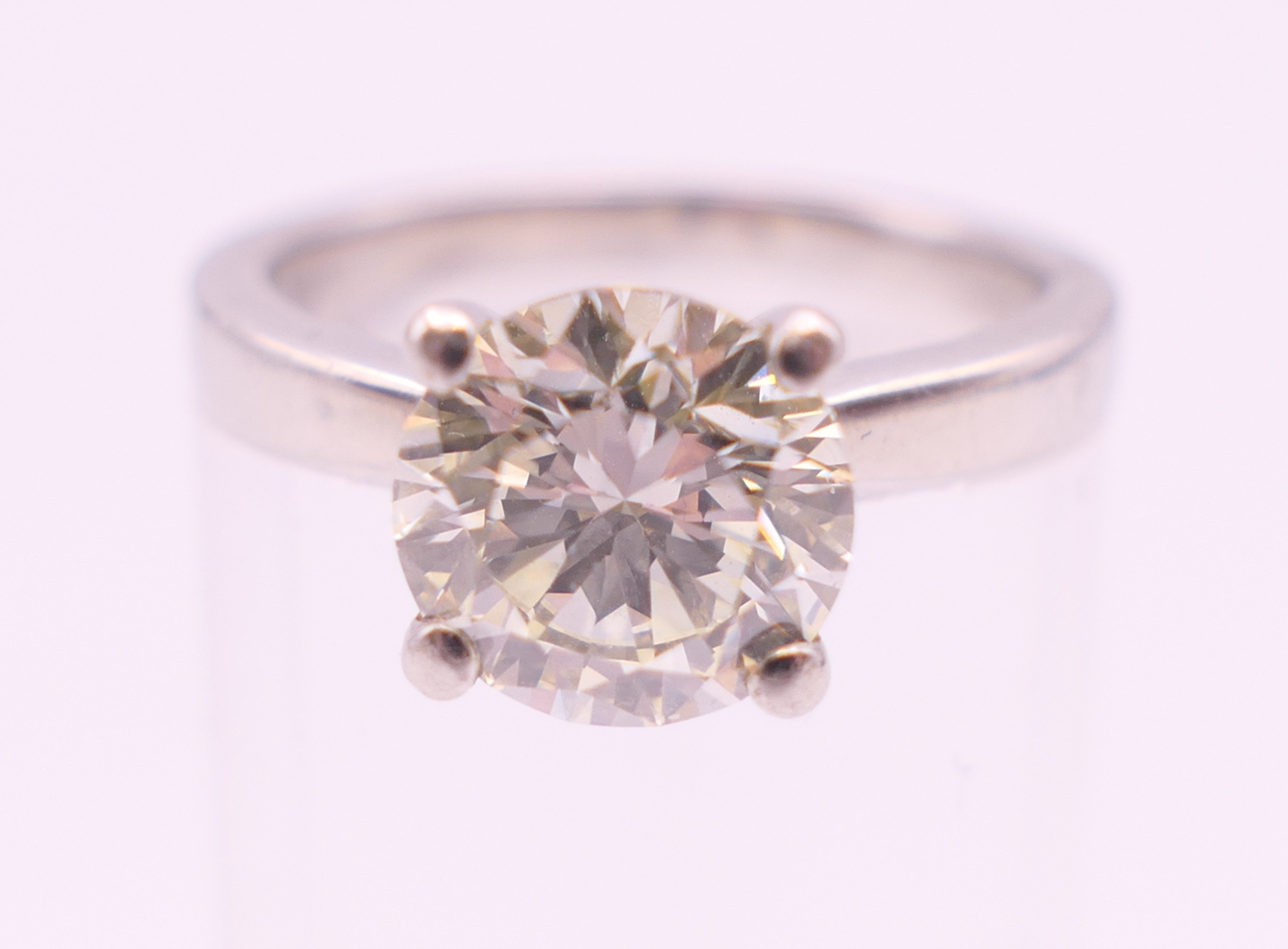 A platinum diamond solitaire ring, the stone approximately 1.9 carats. Ring size L. - Image 2 of 7