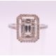An 18 ct white gold ring with 5 baguette cut diamonds surrounded by numerous brilliant cut diamonds. - Image 1 of 8