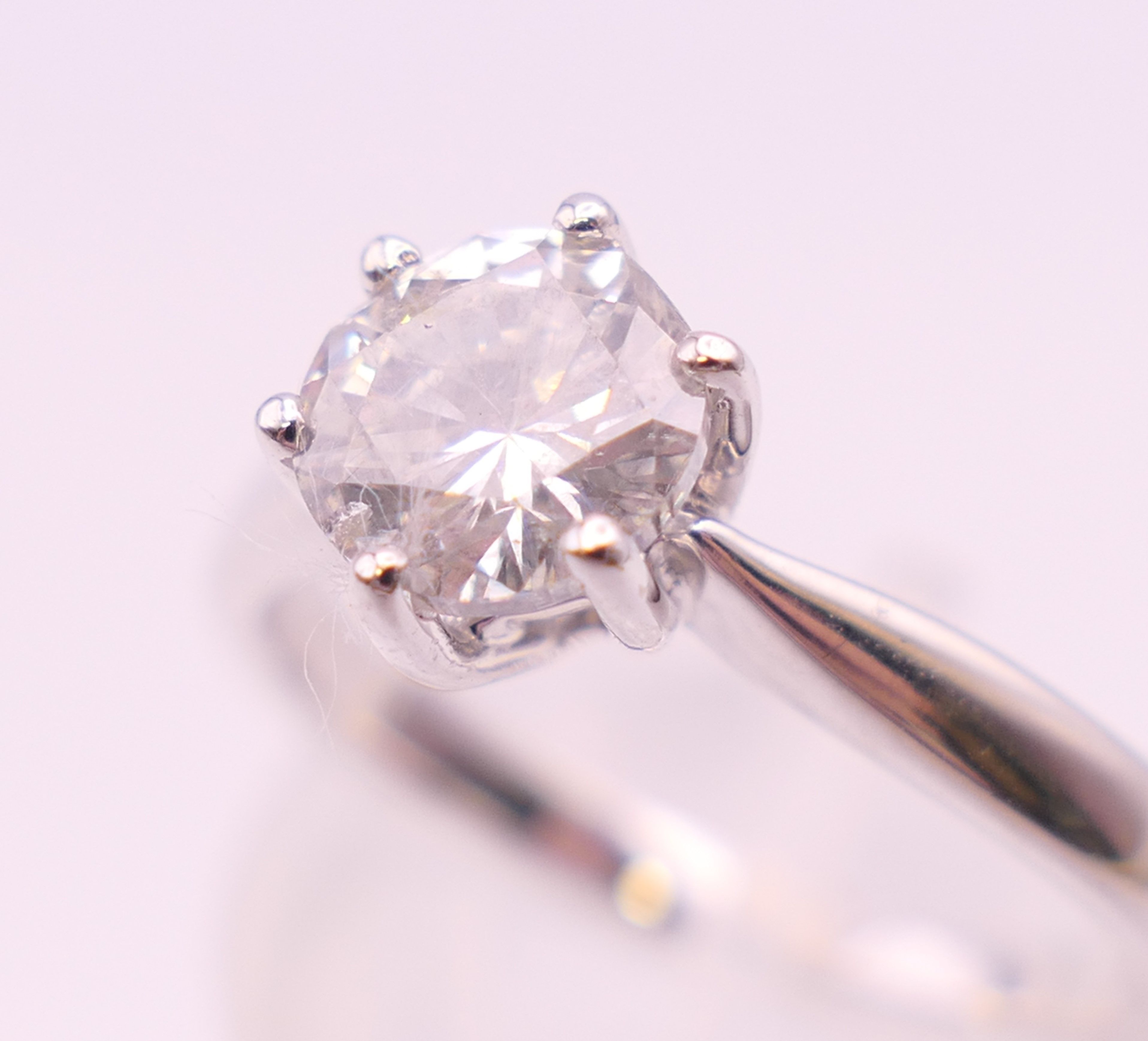 An 18 ct white gold diamond solitaire ring, the stone approximately 0.8 carat. Ring size M. - Image 5 of 6