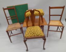 A coffee table, a folding card table, three chairs and a stool.