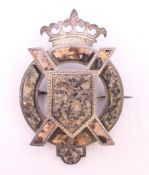 A 19th century silver and hardstone brooch,