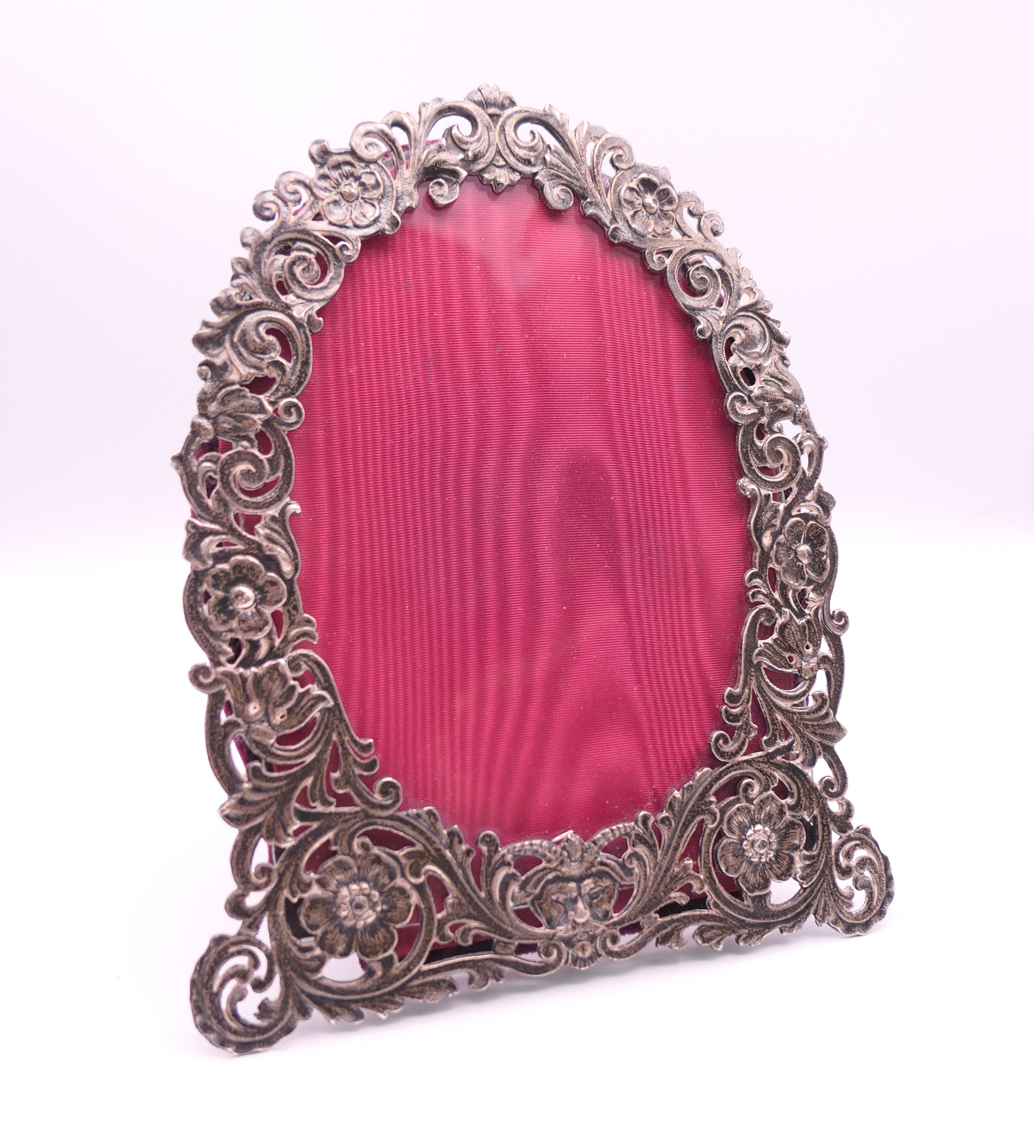 A Victorian silver photograph frame. 17.5 cm high.