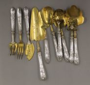 A quantity of French silver handled patisserie cutlery. The largest 24 cm long.