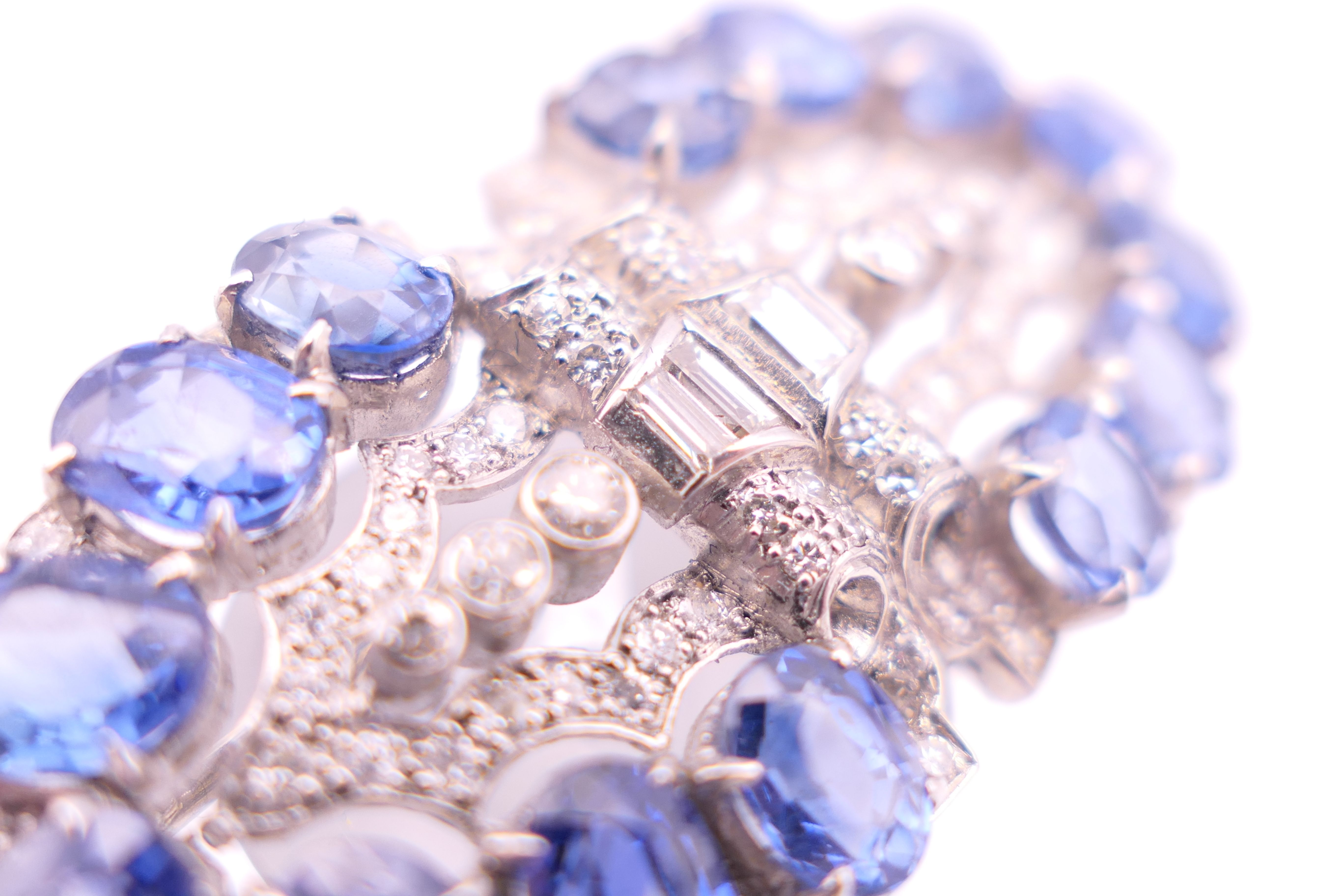 An unmarked Garrard and Co Ltd sapphire and diamond brooch, cased. 5 cm x 2 cm. - Image 13 of 19
